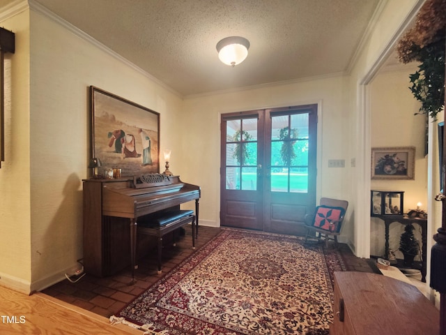 6517 Whitted Rd, Fuquay Varina, NC 27526 - entryway featuring a textured ceiling, crown molding, and brick patterned floors