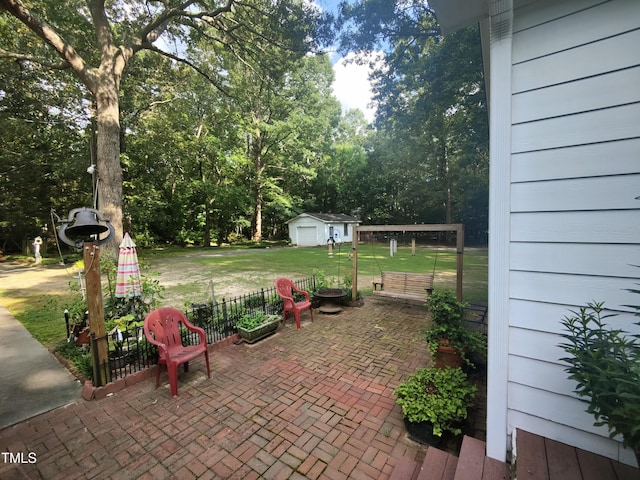 6517 Whitted Rd, Fuquay Varina, NC 27526 - view of patio featuring an outbuilding