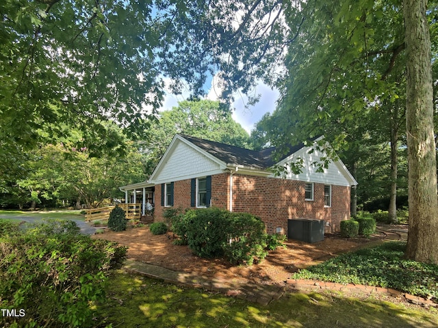 6517 Whitted Rd, Fuquay Varina, NC 27526 - view of home's exterior featuring brick siding and a central air condition unit