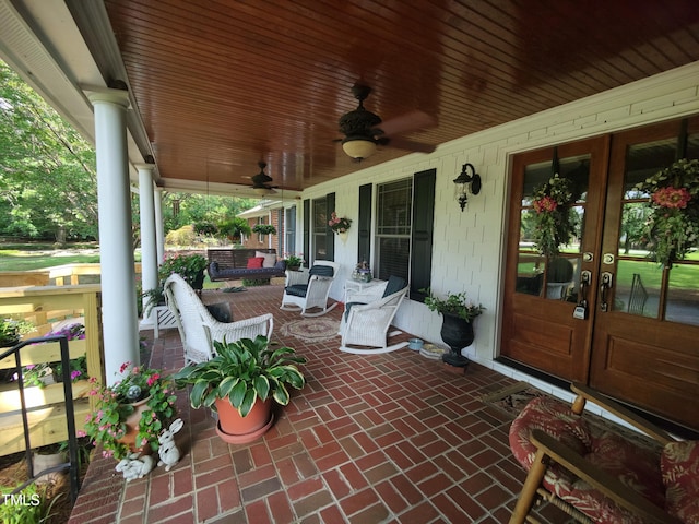 6517 Whitted Rd, Fuquay Varina, NC 27526 - covered porch featuring french doors and a ceiling fan