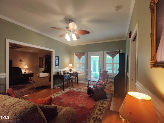 6517 Whitted Rd, Fuquay Varina, NC 27526 - living area with wood finished floors, ceiling fan, and crown molding