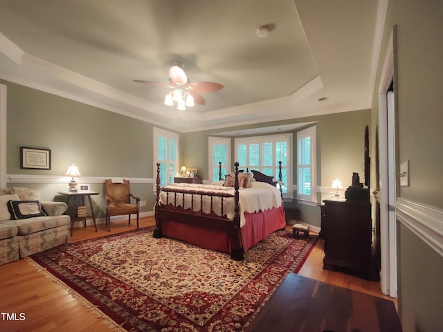 6517 Whitted Rd, Fuquay Varina, NC 27526 - bedroom with a raised ceiling, wood finished floors, crown molding, and ceiling fan