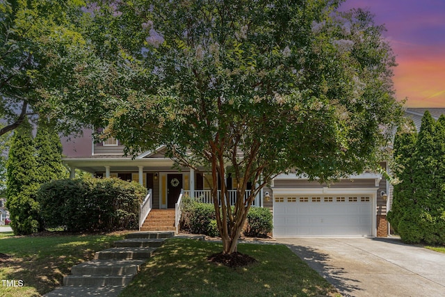 2201 Wide River Dr, Raleigh, NC 27614 - view of property hidden behind natural elements with driveway, stairway, and a porch