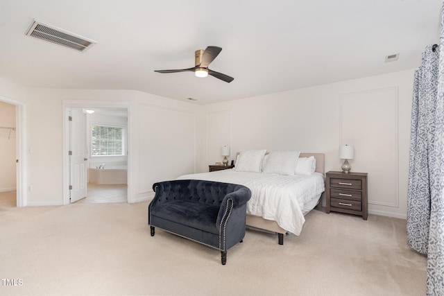 2201 Wide River Dr, Raleigh, NC 27614 - bedroom featuring light carpet, a ceiling fan, and ensuite bathroom