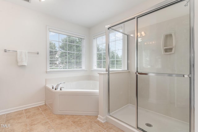 2201 Wide River Dr, Raleigh, NC 27614 - bathroom featuring a bath, a shower stall, and tile patterned flooring