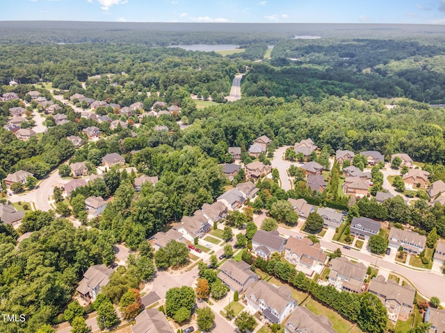 2201 Wide River Dr, Raleigh, NC 27614 - aerial perspective of suburban area with a heavily wooded area