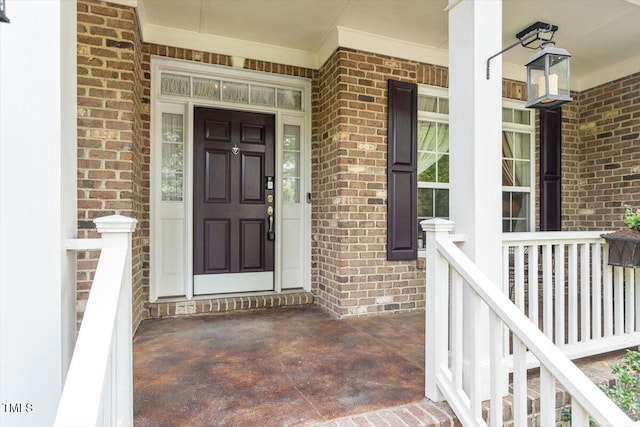 12212 Ashton Woods Ln, Raleigh, NC 27614 - property entrance featuring brick siding and covered porch