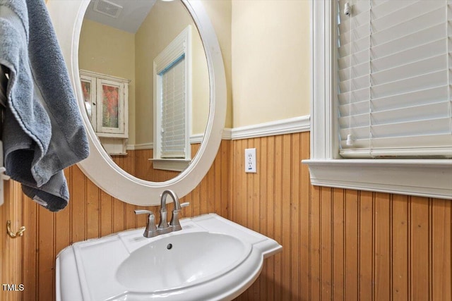 12212 Ashton Woods Ln, Raleigh, NC 27614 - bathroom with a sink and wooden walls