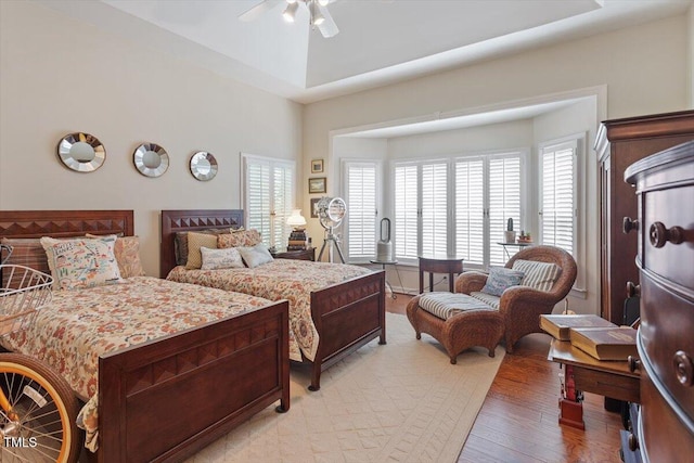 12212 Ashton Woods Ln, Raleigh, NC 27614 - bedroom with light wood-style flooring and a ceiling fan