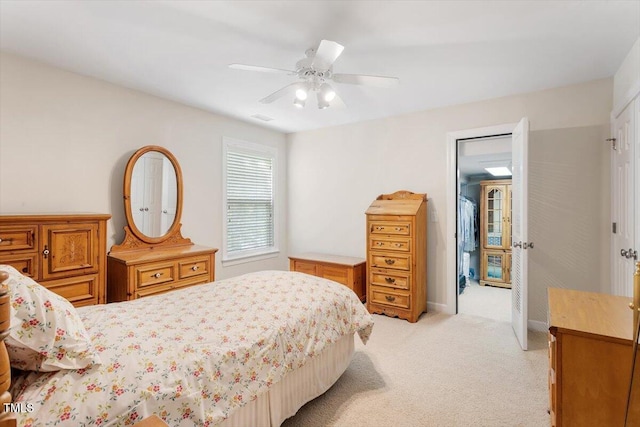 12212 Ashton Woods Ln, Raleigh, NC 27614 - bedroom with light carpet and a ceiling fan