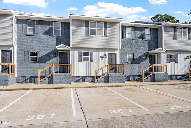 407 E Williams St, Angier, NC 27501 - view of front of house featuring uncovered parking and board and batten siding