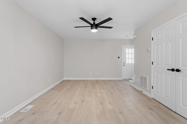 407 E Williams St, Angier, NC 27501 - unfurnished room with ceiling fan and light wood-style floors
