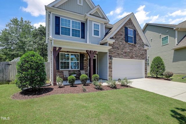 118 Tweedbank Ct, Fuquay Varina, NC 27526 - craftsman inspired home with stone siding, a porch, concrete driveway, and board and batten siding