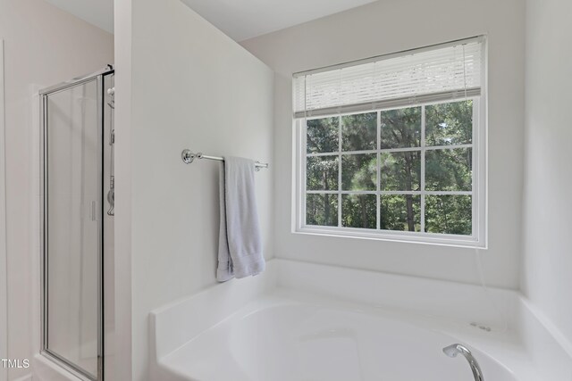 118 Tweedbank Ct, Fuquay Varina, NC 27526 - bathroom featuring a stall shower and a garden tub