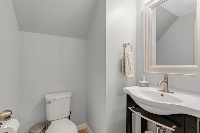 118 Tweedbank Ct, Fuquay Varina, NC 27526 - bathroom featuring vanity and vaulted ceiling