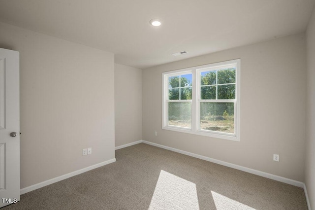1923 Hinesley Dr, Durham, NC 27703 - unfurnished room featuring carpet floors and recessed lighting