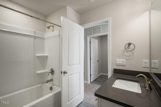 1923 Hinesley Dr, Durham, NC 27703 - bathroom with vanity and shower / bathtub combination