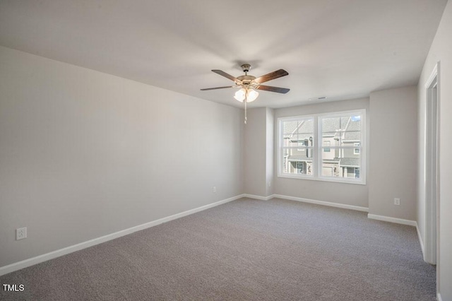 1923 Hinesley Dr, Durham, NC 27703 - carpeted spare room featuring a ceiling fan and baseboards
