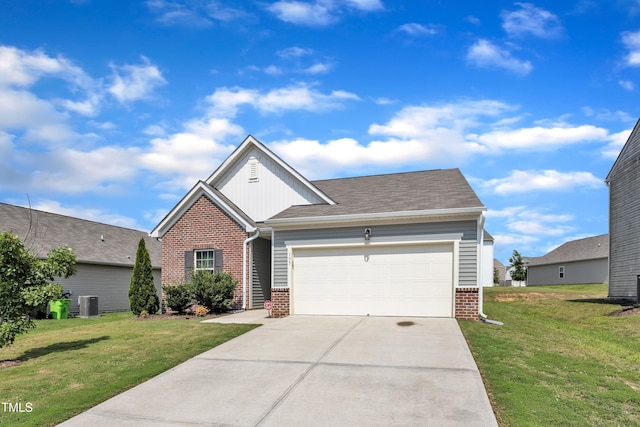 133 Ogden Pond Pl, Zebulon, NC 27597 - view of front of property with brick siding, a garage, concrete driveway, and a front yard