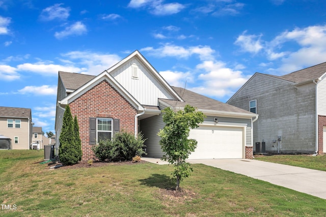 133 Ogden Pond Pl, Zebulon, NC 27597 - view of front of home featuring board and batten siding, an attached garage, brick siding, driveway, and a front yard