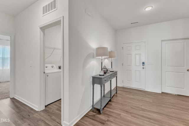 133 Ogden Pond Pl, Zebulon, NC 27597 - foyer with light wood-style floors and baseboards