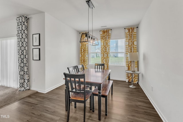 133 Ogden Pond Pl, Zebulon, NC 27597 - dining room with baseboards and dark wood-type flooring