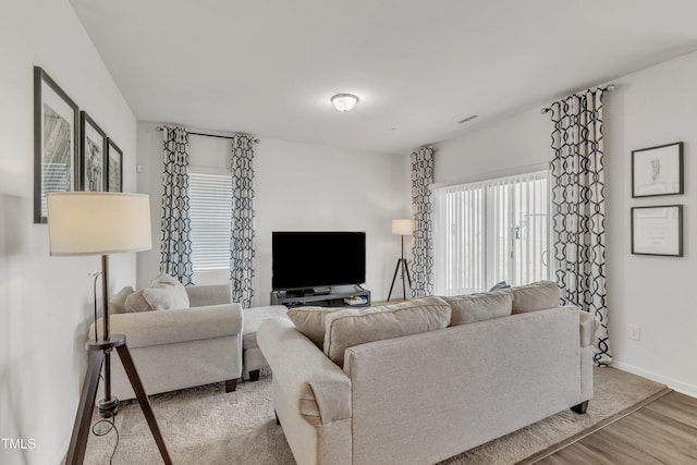 133 Ogden Pond Pl, Zebulon, NC 27597 - living room with wood finished floors and baseboards