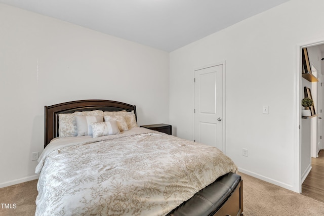 133 Ogden Pond Pl, Zebulon, NC 27597 - bedroom with light carpet and baseboards