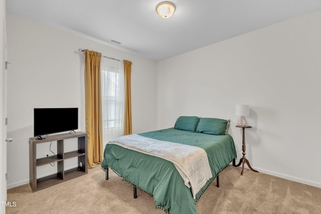 133 Ogden Pond Pl, Zebulon, NC 27597 - carpeted bedroom featuring baseboards