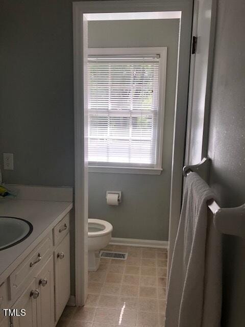 5018 Gatewood Dr, Durham, NC 27712 - bathroom with toilet and vanity