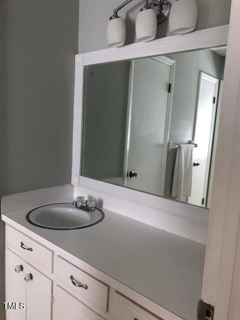 5018 Gatewood Dr, Durham, NC 27712 - bathroom with vanity
