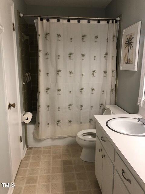 5018 Gatewood Dr, Durham, NC 27712 - full bath with vanity and shower / bathtub combination with curtain