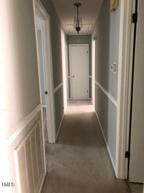 5018 Gatewood Dr, Durham, NC 27712 - corridor featuring attic access and carpet flooring