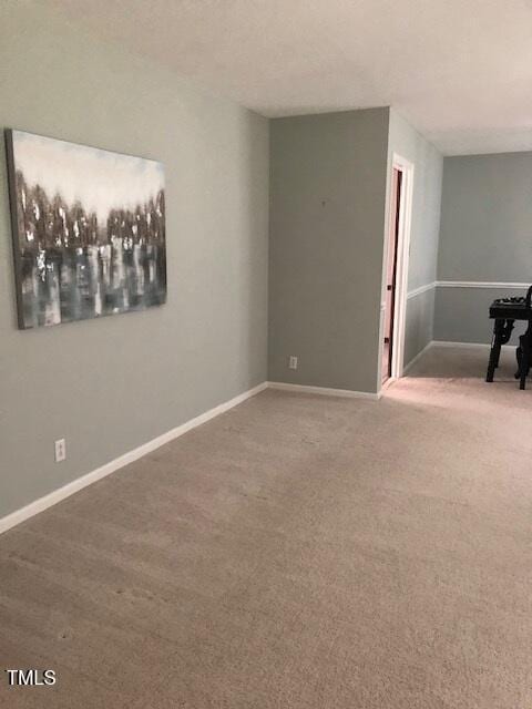 5018 Gatewood Dr, Durham, NC 27712 - carpeted empty room featuring baseboards