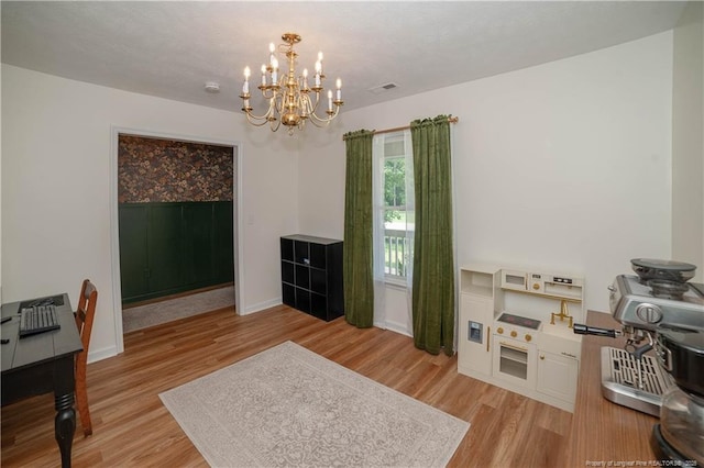 2517 Previs Rd, Fayetteville, NC 28306 - rec room featuring light wood-type flooring and a chandelier