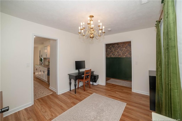 2517 Previs Rd, Fayetteville, NC 28306 - office space featuring light wood-type flooring and a chandelier
