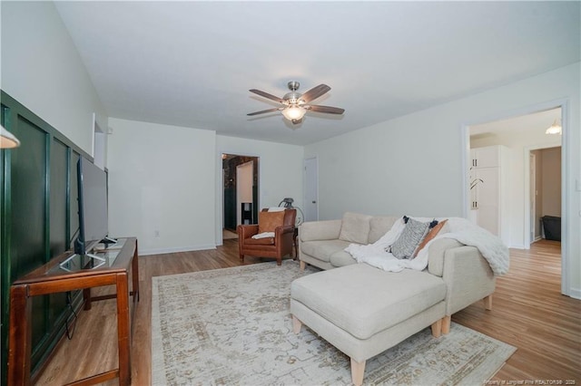 2517 Previs Rd, Fayetteville, NC 28306 - living room featuring wood finished floors and ceiling fan