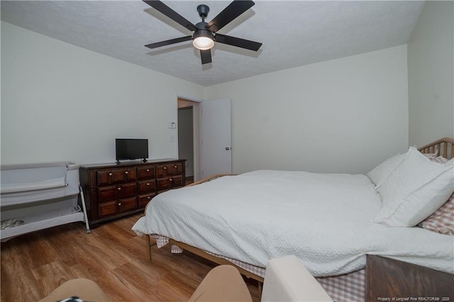 2517 Previs Rd, Fayetteville, NC 28306 - bedroom with wood finished floors and ceiling fan