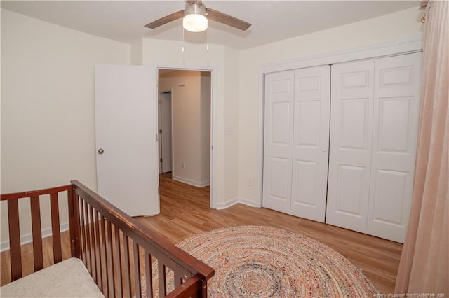 2517 Previs Rd, Fayetteville, NC 28306 - bedroom featuring wood finished floors, a closet, and a ceiling fan
