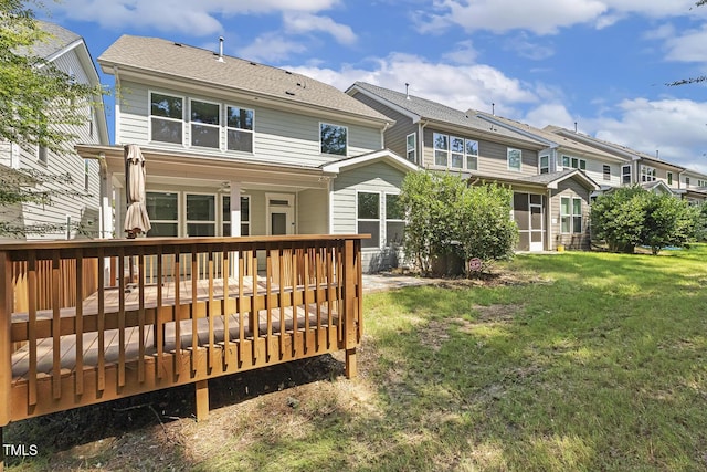 261 Begen St, Morrisville, NC 27560 - back of house with a lawn and a deck