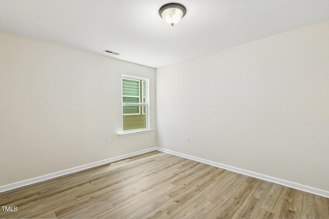 261 Begen St, Morrisville, NC 27560 - spare room featuring light wood finished floors and baseboards
