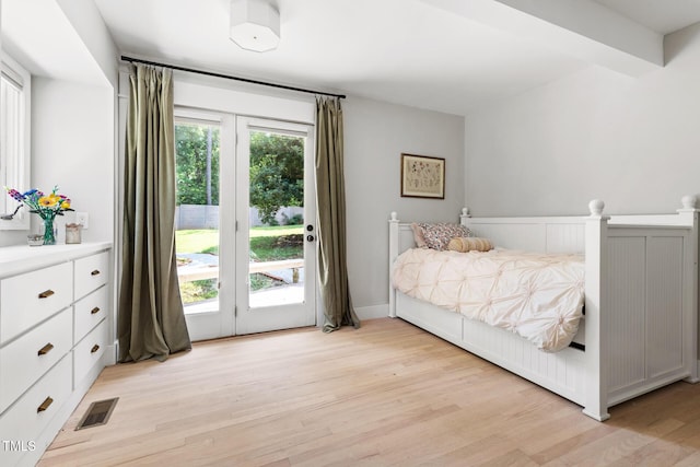 317 Reade Rd, Chapel Hill, NC 27516 - bedroom with access to exterior and light wood-type flooring