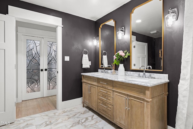 317 Reade Rd, Chapel Hill, NC 27516 - full bath featuring double vanity and marble look tiles