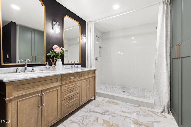 317 Reade Rd, Chapel Hill, NC 27516 - full bath featuring double vanity, tiled shower, marble finish flooring, and recessed lighting