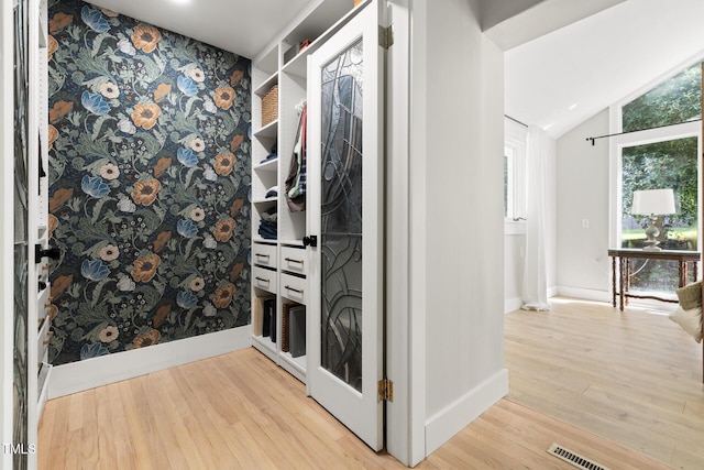 317 Reade Rd, Chapel Hill, NC 27516 - corridor featuring wood finished floors and lofted ceiling