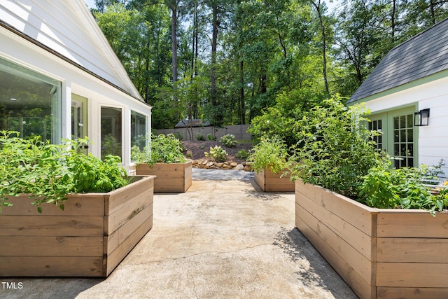 317 Reade Rd, Chapel Hill, NC 27516 - view of patio featuring a garden