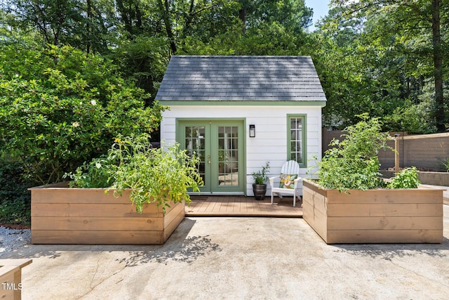 317 Reade Rd, Chapel Hill, NC 27516 - view of outdoor structure featuring a vegetable garden and french doors