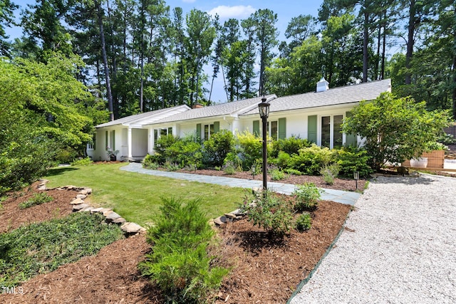 317 Reade Rd, Chapel Hill, NC 27516 - single story home with a front yard and a chimney