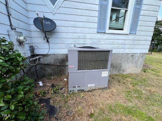401 Division St, Norlina, NC 27563 - exterior view of a central air condition unit and electric meter