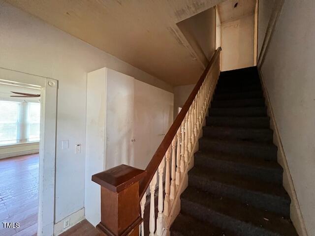 401 Division St, Norlina, NC 27563 - stairs featuring wood finished floors